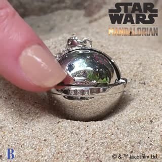 Peek-a-boo! The charm of Grogu is captured with hand-enameling in this stellar necklace. #themandalorian #grogu Click to shop: https://bit.ly/3LsRy82 | The Bradford Exchange