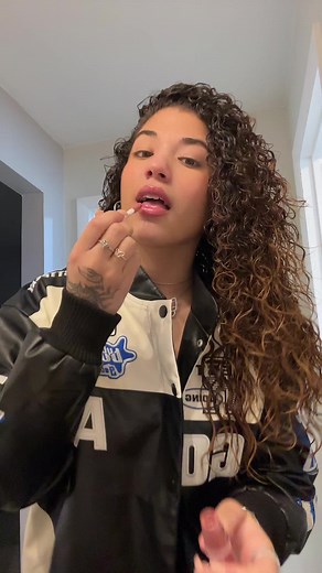 Lip Gloss Application and Fashion Showcase