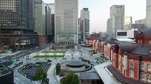 Stock Video People And Cars Moving In A City Of Large Buildings LargeLive Wallpaper