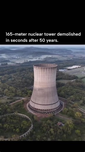 Curvico Explained on Instagram: "The 165-meter cooling tower of the Hartsville Nuclear Power Plant in Tennessee was demolished in a planned explosion after nearly 50 years of existence. Originally part of an unfinished nuclear project from the 1970s, the tower became a familiar landmark and a reminder of both the promise and the decline of the American nuclear era. Engineers carried out a precise and controlled demolition, using carefully placed explosives to bring the massive concrete structure
