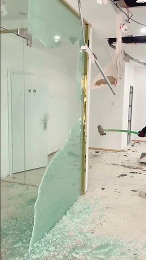 Demolition Work: Breaking Tempered Glass with a Sledgehammer