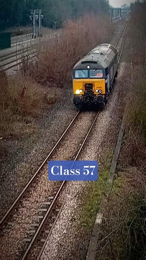 Class 57303 passing under Blaby Road bridge in South Wigston