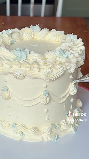 I had a bit of spare time today, so of course I had to practice some techniques with this mini vintage cake, how cute are the little bows?! 🤍 Round vintage cakes are becoming my favourite after being obsessed with heart cakes for a while! #cakedecorating #bowcake #caketok #roundvintagecake #bowcakeideas #vintagecake #cakeideas #cakesforgirls