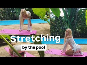 ￼Stretching by the pool