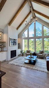 Step inside Artisan Home No. 16 by @tjbhomesinc ☀️ Ten-foot-tall ceilings with vaults and steps throughout create an airy atmosphere indoors. The open-concept great room is perfectly suited for entertaining, with the main living space, kitchen (complete with a butler’s pantry), and dining area arranged for an easy flow and maximum views. | Parade of Homes Twin Cities