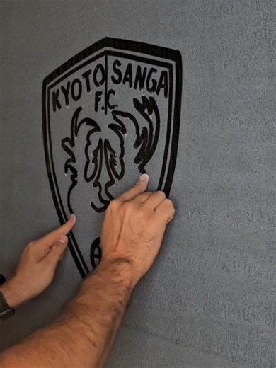 Kyoto Sanga FC logo two hands drawing