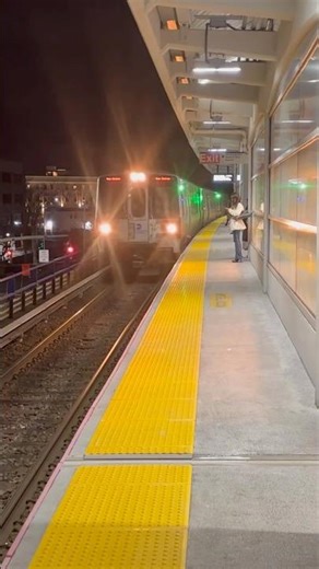 Penn Station bound LIRR M9 train arriving at Hicksville