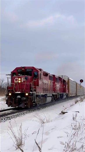 CP 3011 GP38AC passing the mile 24 signal