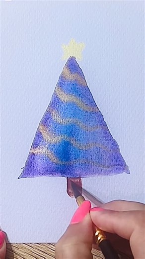 Watercolor by Annie on Instagram: "Easy peasy Christmas tree in my Holidays Greetings Series today! All you need is cold press watercolor paper, no.3/4 pointed round watercolor brush and some purple and blue watercolors. For some extra festive shimmer and shine I used metallic watercolors. Now enjoy the painting process!! #holidayart #christmascard #tistheseason #handpainted #christmastree"