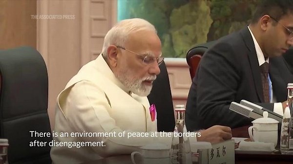 Modi meets Xi as China and India seek to rebuild ties