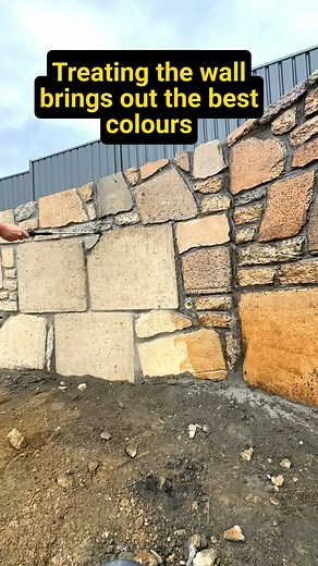 Final Touches on Recycled Concrete Retaining Wall