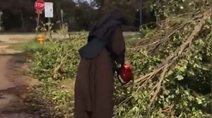 Chainsaw-wielding nun helps clear Irma debris
