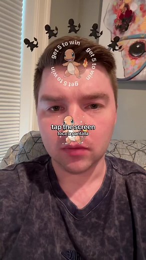 Catching Charmander in the Pokemon Mobile Game