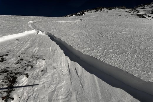Skier buried up to waist after triggering backcountry avalanche in Alberta Rockies
