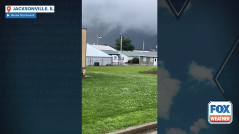 Watch: Tornado looms over fairgrounds in central Illinois