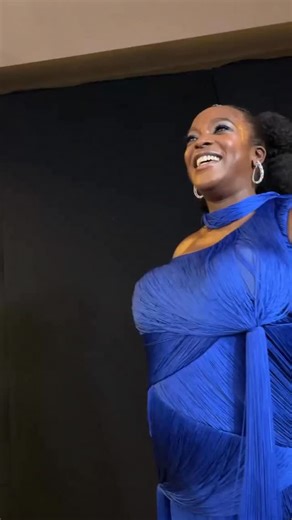 ‘Best Supporting Actress’ BAFTA winner Wunmi Mosaku, who also took home her award for ‘Sinners,’ watches as Ryan Coogler delivers his winning speech for ‘Best Original Screenplay’ at the 2026 BAFTAs. | Vanity Fair