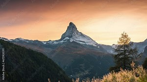 Golden sunset over Matterhorn, Iconic mountain peak and meadow in rural scene at Zermatt, Switzerland