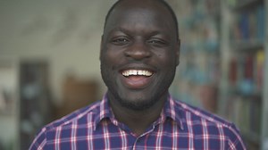 Man laughing head-on closeup - Free Stock Video