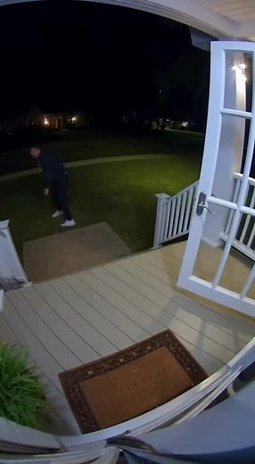 Homeowner Launches Himself Off Porch to Save Cat From Predator Sneaking In From the Darkness Asheville, North Carolina – November 23, 2025 A late-night security camera captured a breathtaking act of instinct and bravery when a homeowner hurled himself out the front door to save his cat from a large predator creeping toward the porch. The video begins with the house cat sitting casually on the doormat, unaware of the danger stalking just beyond the glow of the porch light. Out of the blackness, a