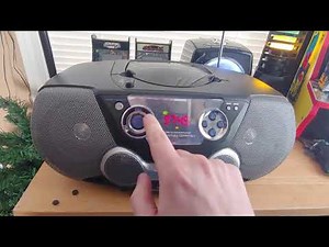 Philips AZ1300 CD Soundmachine plus a Thunderbird neon clock radio CD player and a lava lamp