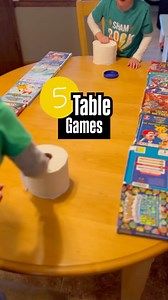 Looking for fun but simple table games? Here are 5 to try! 1. Table Hockey - Build borders on your table using books. Then grab toilet paper rolls and a container lid and you are ready to play! Hit the lid off the end of your opponent’s side of the table to score a point. 2. Color Sorting - Tape colored pieces of paper on each side of the table. Then tape two pool noodles together. Roll colored balls down a piece of cardboard and have your kids use the pool noodles to sort the colored balls and 