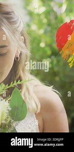 Animation of rainbow heart over rainbow stripes. lgbtq pride and equality celebration concept digitally generated video.