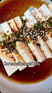 Drain 1 package of cold silken tofu and place it on a serving plate. In a small bowl, mix; 2 Tbsp soy sauce, 2 tsp toasted sesame oil, 1 tsp sugar (or honey) 1 tsp minced garlic 1 tsp gochugaru (chili flakes) 1 tsp rice vinegar (mirin) 1 finely chopped green onion 1/2 finely sliced jalapeño (optional) Pour the sauce over the tofu, and top with toasted sesame seeds. Best served cold. #korean #koreanfood #koreanrecipes #tofu #tofurecipes #두부 #silkentofu | Jessica Woo