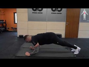 Cómo realizar el ejercicio de plancha con toque de hombros + encogimiento de piernas.