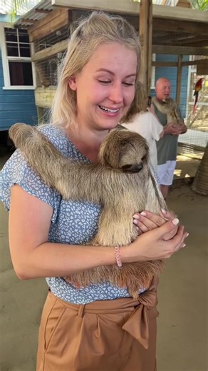 One of my fav 2022 moments…pulled a Kristen Bell while finally getting to hold a sloth 😭