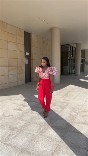 Elevate your style with this chic ensemble: bold red pants paired with an elegant brocade top. Perfect for making a sophisticated statement | Almondant
