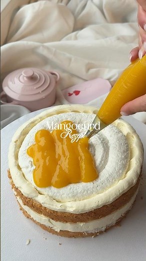 You'll love this filling 💛🥭 #baking #cake #recipe #food
