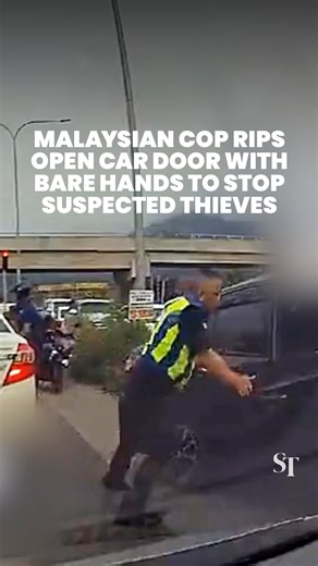 The Straits Times on Instagram: "Captain Malaysia, is that you? 🇲🇾 A police officer has gone viral for ripping open a car door to apprehend 2 suspected thieves in Kota Kinabalu. #Malaysia #KotaKinabalu #StraitsTimes"