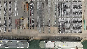 4k time lapse of new cars line up . Automotive load onto container carriers floating in sea, business services import export goods international by Roll-on Roll-of ship large in the Ocean freight,