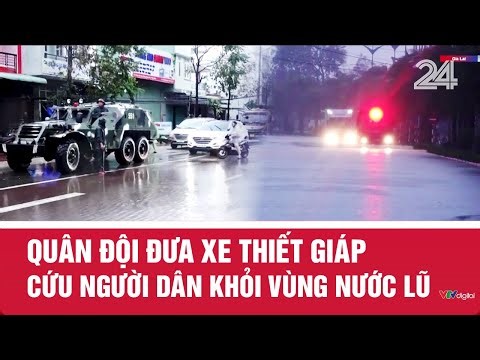 Quân đội đưa xe thiết giáp cứu người dân khỏi vùng nước lũ | VTV24