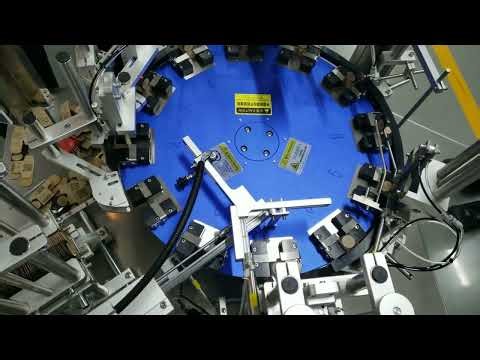 Tutorial how to learn the operation process of vertical type plastic parts feeding cartoning machine