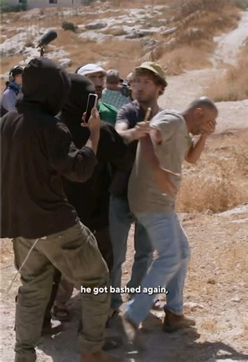 As a Palestinian family tries to reach their home in the West Bank, young Israeli settlers known as Hilltop Youth confront them. One settler repeatedly headbutts Hassan Faraj in the face.