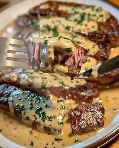 Juicy Steak with Creamy Garlic Sauce Ingredients: - 4 beef steaks (sirloin or ribeye) - 2 tablespoons olive oil - Must express something to keep getting my recipes.... Thank you. Get Full Recipe in First (c.o.m.m.e.n.t ).👇 | Tasty Recipes