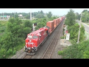 CPKC Livery! Brand New Tier-4 Gevo Leads a Huge Stack Train CPKC 112 thru Pointe Claire, Quebec