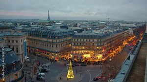 Paris, France Christmas tree illuminated at night during the Christmas season in centre Paris