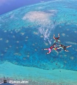 200K views · 4.5K reactions | MEN SKY DIVE OVER BELIZE’S GREAT BLUE HOLE  | Belize News Network | Facebook