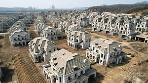Inside abandoned Chinese ‘ghost town’ of mansions reclaimed by farmers