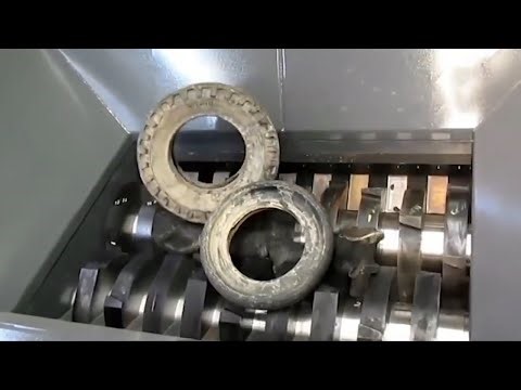 Modern crushers destroy giant car tires | mass destruction machine.