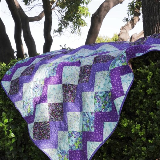 When you purchase a no cutting quilt kit from The Quilt Kit Co, there’s no need to worry about whether your fabrics will look beautiful together--we’ve done that work for you! All of our quilt kits include a printed pattern, precut pieces for your quilt top, precut pieces for the binding (and borders) with backing available separately. | The Quilt Kit Co