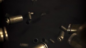 Falling Bullet Casings in Motion