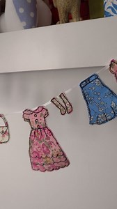 Miniature freemotion washing line! I made this tiny appliqué a few years ago and it still has pride of place in my sewing room. Every little dress, pair of trousers and tiny top is stitched in my favourite scrappy fabrics — it makes me smile. It also happens to match my Washing Line cushion cover sewing pattern perfectly so if you fancy giving this a try you can use the templates from this design. Link in comments. #helennewtonsews #AppliqueCrafts #freemotionembroidery #sewinginspiration If you 