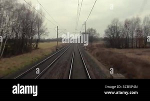 Train journey point of view from drivers window windshield, cloudy countryside, straight railway tract Stock Video Footage - Alamy