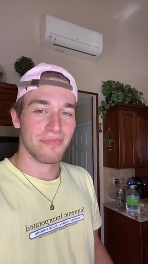 Dad's Doubtful Reaction to Apple Juice Bottle Crunching