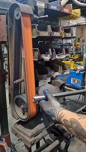 One of the things that makes the All-Packa so special is the number of mounting options it has. Along with the wide range of frame bags and racks available, the frame comes standard with four 3-pack mounts and a 4-pack mount on the top tube. Here, you can see Jeff skifully using a jig to drill the down tube mount, ensuring consistent placement every time. #custombuilds #bikefabricating #bikeshop #bikefriday #framebuilding #bikepacking #steeley #travelbike | Bike Friday