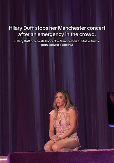 In the middle of the Manchester show, Hilary Duff suddenly stopped the concert after fans started pointing and waving for help. She sat down on the stage, asking if everything was okay and whether there was another emergency, while security/medics helped the person out of the crowd. Once she got the thumbs-up that everything was okay, she reminded everyone to look after themselves, drink water and stay safe. The crowd applauded when it seemed the situation had been handled, and Hilary went on to
