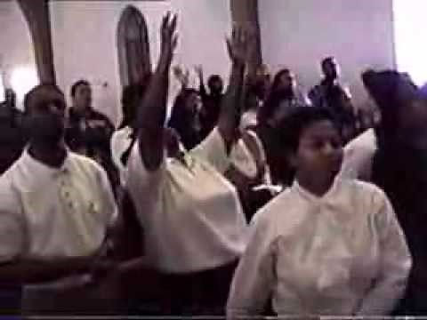 Holy Ghost Idiot Woman takes a fall shouting in church.